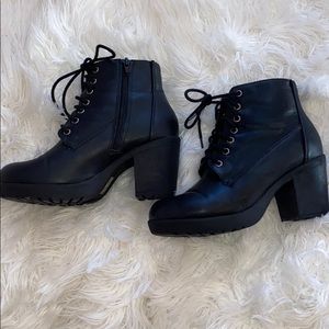 Black combat boots with heel